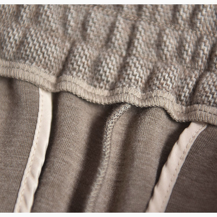 Women wear straight trousers outside in winter